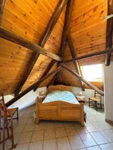 Кровать или кровати в номере La Ferme de la Tour