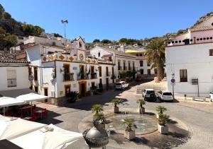 an aerial view of a town with buildings at Hotel Rural Palacete de Mañara in Montejaque