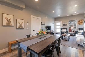 a living room with a dining table and a living room at Modern abode in Central Missoula! in Missoula