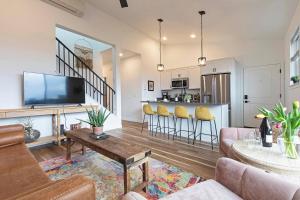 a living room with a couch and a table at The Railway Lofts 201 in Missoula