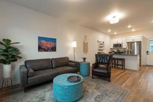 a living room with a couch and a table at The Railway Flats 101 in Missoula