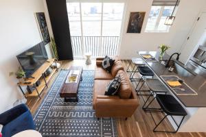 a living room with a couch and a table at The Railway Lofts 202 in Missoula