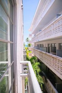 a view of a balcony of a building at Miami Ocean Drive 1BR APT & Rooftop Pool Access in Miami Beach