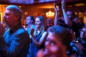 a crowd of people dancing in a club at Trihotel Rostock - Wellnesshotel Adults Only in Rostock +28 photos