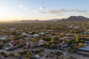 an aerial view of a small town in the desert with mountains at Mountain Views - Pool - Games - YogaDeck in Carefree