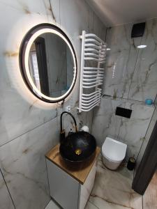 Ένα μπάνιο στο Ferienwohnung in Parknähe 3