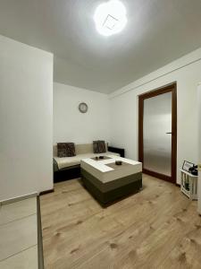 Ένα ή περισσότερα κρεβάτια σε δωμάτιο στο Central Studio