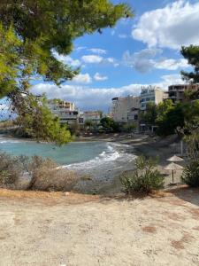 a view of a beach with buildings at VERORE aprtm in Chalkida
