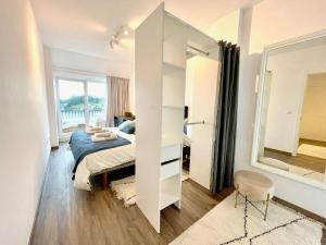 Ένα ή περισσότερα κρεβάτια σε δωμάτιο στο The Cliffs - Ria do Vicedo