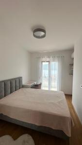 Ένα ή περισσότερα κρεβάτια σε δωμάτιο στο Bella Vista Lux apartment