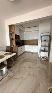 Η κουζίνα ή μικρή κουζίνα στο Bella Vista Lux apartment