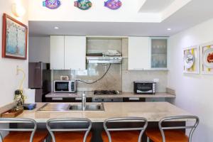 Imagine din galeria proprietății Beachfront 4beds Jacuzzi Privacy Full Kitchen în La Puntica de Juan Dolio