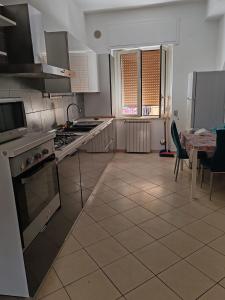 Dapur atau dapur kecil di B&B di Marta Santimone