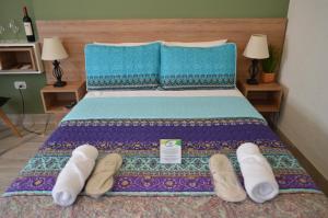 Giường trong phòng chung tại Gosén Cabañas y Suites +59 ảnh