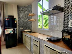 Nhà bếp/bếp nhỏ tại Phing Villa