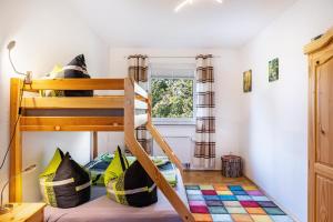 Postel nebo postele na pokoji v ubytování Ferienhaus am Wald