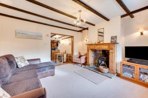 Et tv og/eller underholdning på Tones Cottage