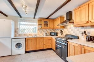 Køkken eller tekøkken på Tones Cottage + 3 billeder