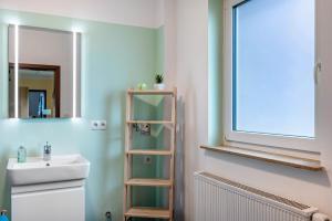 Koupelna v ubytování Ferienhaus am Wald + 15 fotografií