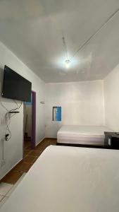 Katil atau katil-katil dalam bilik di Hotel Lider +6 gambar