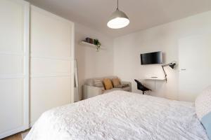 Ένα ή περισσότερα κρεβάτια σε δωμάτιο στο Casa Dei Colli & Terme - 10min da Abano e ospedale