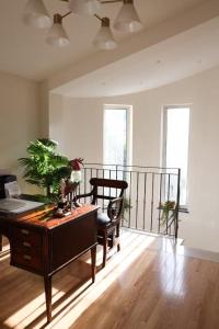 a living room with a desk and a chair at Country House, on the slopes of Vesuvius 3 in Terzigno