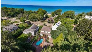 an aerial view of a house with the ocean at Inn Like a Lamb in South Haven