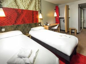 Postel nebo postele na pokoji v ubytování ibis Leicester + 62 fotografií