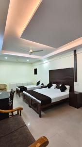 Photo de la galerie de l'établissement UPPERCREST RESIDENCY PALA, à Pala 49 autres photos