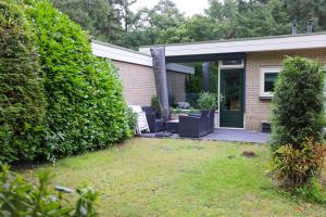 สวนหย่อมนอก Veluwe Nature Cottage for 2 people I Luxury kitchen