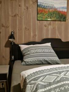 Postel nebo postele na pokoji v ubytování New Mountain Cabin With Views Over Eggedal