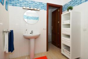 a bathroom with a sink and a mirror at Apartment La Raspa Sea Views 2 Bedrooms By PVL in Arrecife +23 photos