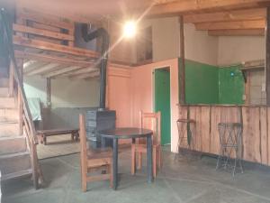 Kuchyň nebo kuchyňský kout v ubytování Serendipia Cabaña en zona semirural