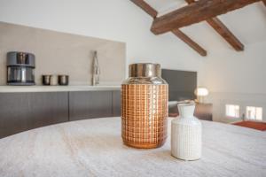 Postel nebo postele na pokoji v ubytování Respiro di Ghirlandina - Rua Frati 34 - Boutique Apartments