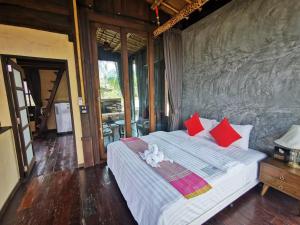 Ένα ή περισσότερα κρεβάτια σε δωμάτιο στο Relax House Lanta Old Town +134 φωτογραφίες
