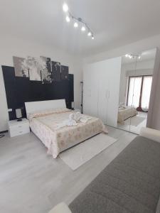 Ένα ή περισσότερα κρεβάτια σε δωμάτιο στο Casa Vinci