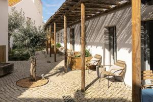 Patio nebo venkovní prostory v ubytování Charming Design House In Montijo With Garden - 41 + 6 fotografií