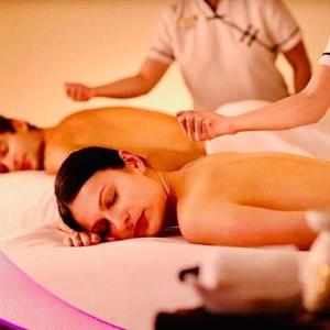 a naked woman laying on a bed getting a massage at dar annee in Fès +8 photos