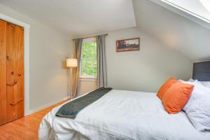 a bedroom with a white bed and a window at Outdoor-Adventure Haven 14 Mi to Mount Snow Skiing in South Newfane