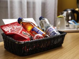 a basket filled with drinks on a table at ibis Glasgow City Centre – Sauchiehall St in Glasgow