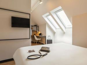 ナミュールにあるIbis Namur Centreのベッドルーム1室(グラス1組付) +45枚の写真