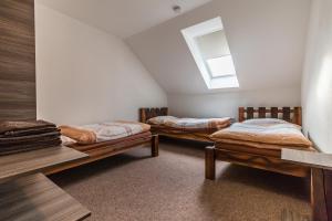 Postel nebo postele na pokoji v ubytování Apartmány U Babičky