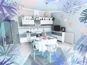 Η κουζίνα ή μικρή κουζίνα στο Un Mirage Tropical - Bulles , Spa & Détente en Bord de Loire