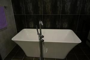 Koupelna v ubytování MU Hotel