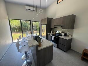 Kuchyň nebo kuchyňský kout v ubytování Vacation Villa in La Palma