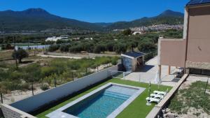 an aerial view of a villa with a swimming pool at VILLA RINCON DEL BUITRE in Moratalla