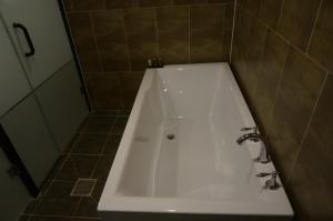 Koupelna v ubytování MU Hotel