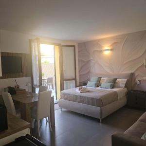 Ένα ή περισσότερα κρεβάτια σε δωμάτιο στο Casa Nova Garden