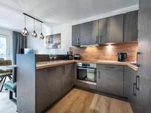 Kuchyň nebo kuchyňský kout v ubytování Apartment Dreams by Interhome + 20 fotografií