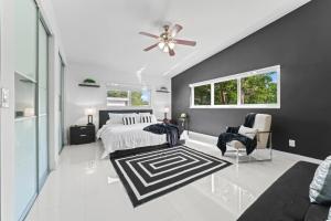 Ένα ή περισσότερα κρεβάτια σε δωμάτιο στο Casa Joia - Pool - 15min Beach - 5 min to shul +30 φωτογραφίες